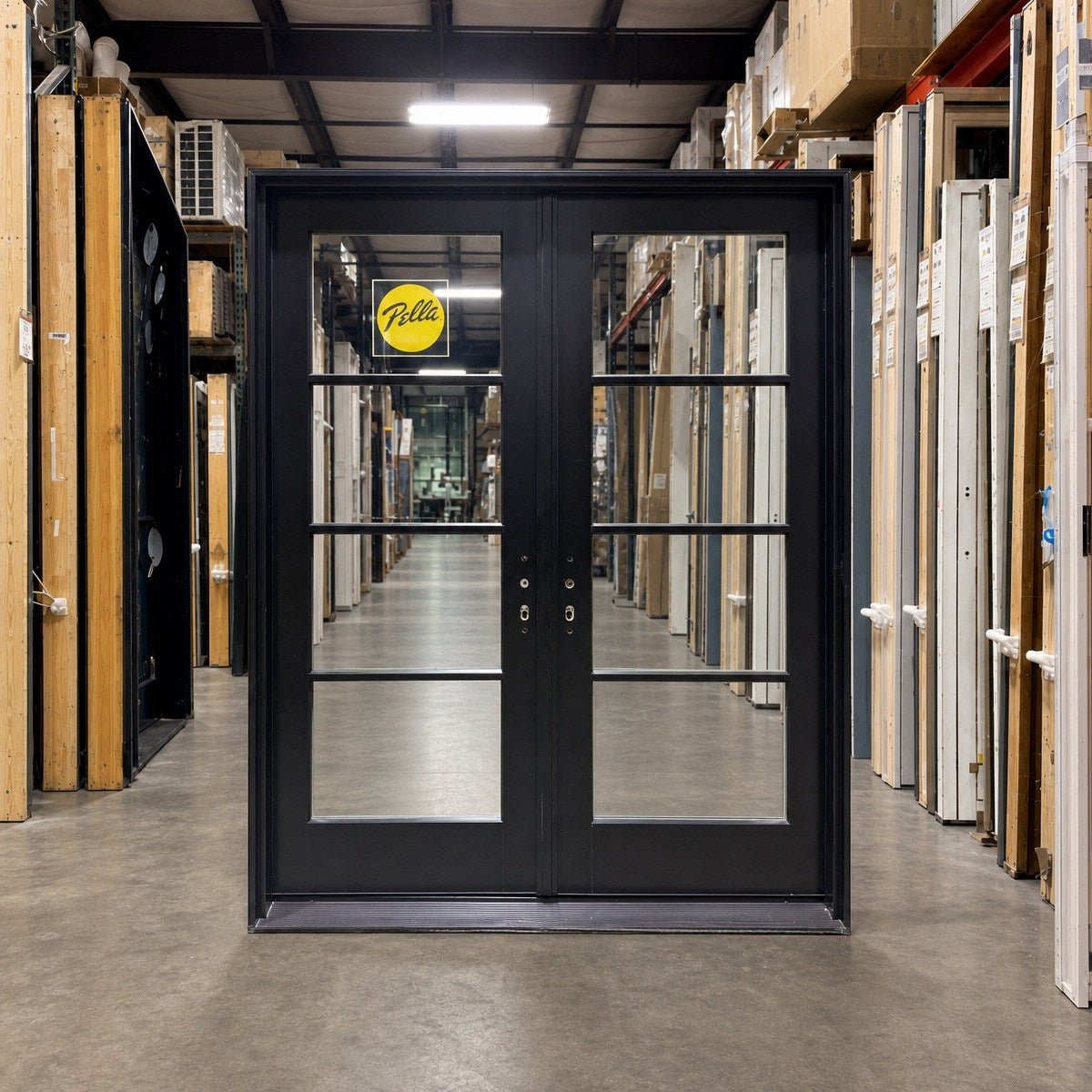Black Pella double door in the Clark Deals warehouse