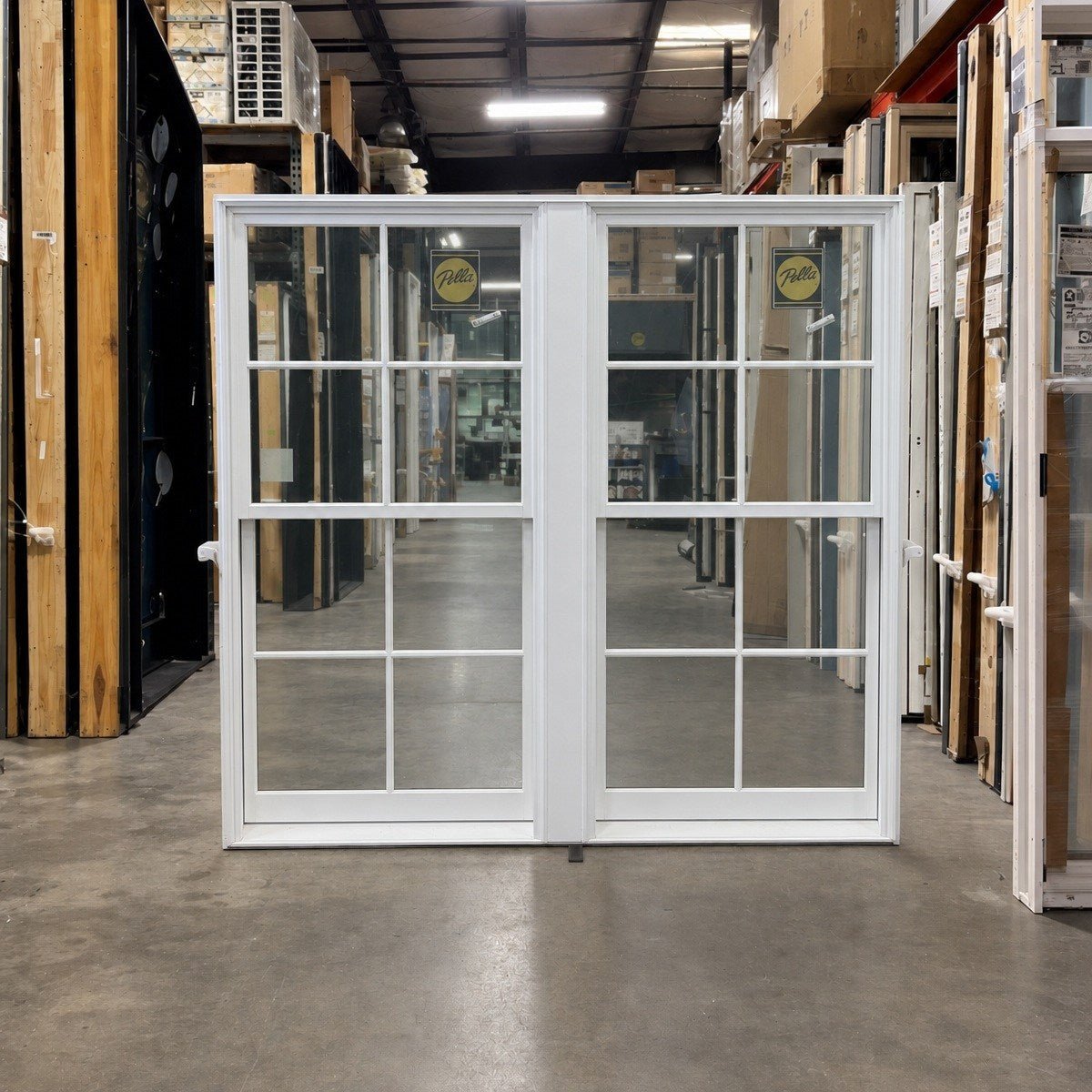 White Pella windows in the Clark Deals warehouse