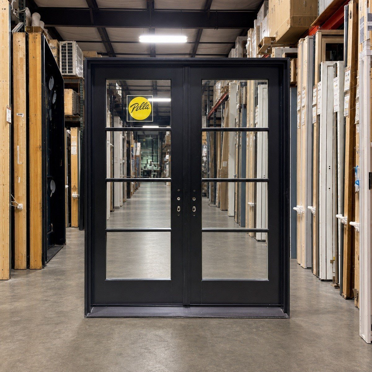 Black Pella double door in the Clark Deals warehouse